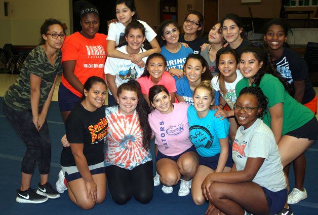 The Decatur cheerleaders take time out of their practice to pose together. The girls practice for three hours