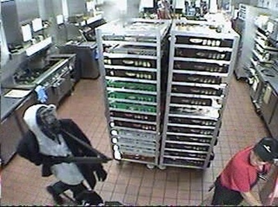 Surveillance photo of robbery suspect.