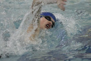 Federal Way High School’s Reid Collins swims the 200-yard freestyle during Thursday’s dual meet with the Kent-Meridian Royals at the Federal Way Community Center.