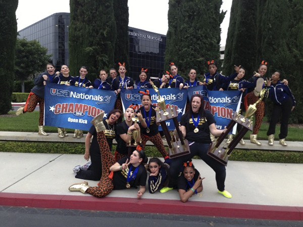 The Decatur High School dance team holds up the trophies and banners they won at the recent 2013 USA Dance/Drill Nationals in Costa Mesa