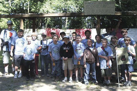 A picture of the Webelos den (fourth- and fifth-graders) taken in front of the archery range at Camp Kilworth in Federal Way this month during Cub Scout twilight camp.