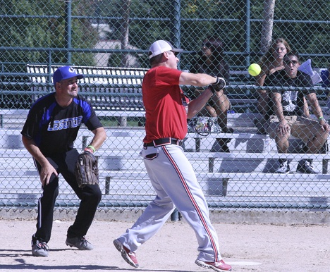 Federal Way resident Charlie Puglisi swings at a pitch for the Des Monies Softball Club during the Men’s ‘E’ Western Worlds Tournament Friday at Celebration Park. The four-day tournament included 110 teams from all over. Somethin’ Different from Lake Tapps won the tournament title.