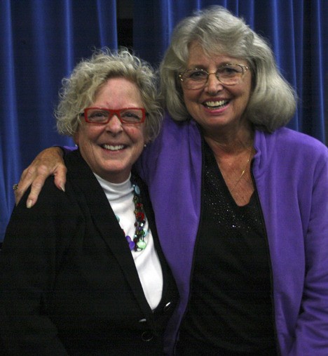 Federal Way School Board position 2 candidates (left to right) Claire Wilson and Gail Crabtree share a friendly congratulations after their forum Oct. 12 at Federal Way High School’s little theater. In the only contested school board race