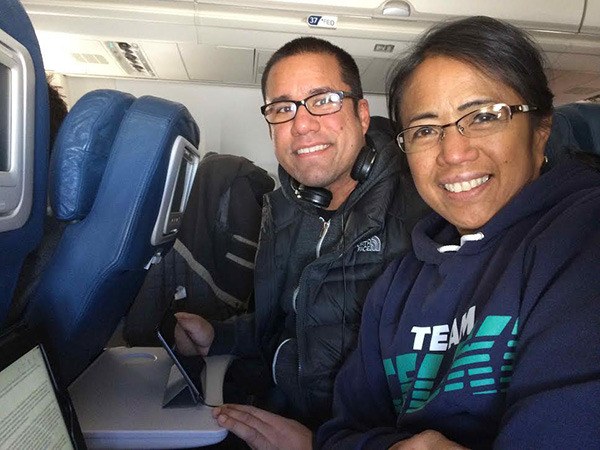 Chris Celski (left) and Sue Celski are pictured on the plane heading Seattle to New York City. From there