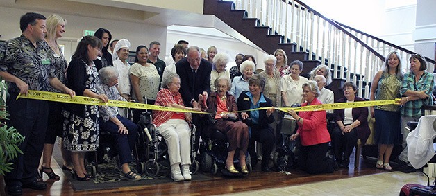 Ribbon cutting at the Aug. 9 grand re-opening celebration for Foundation House in Federal Way.