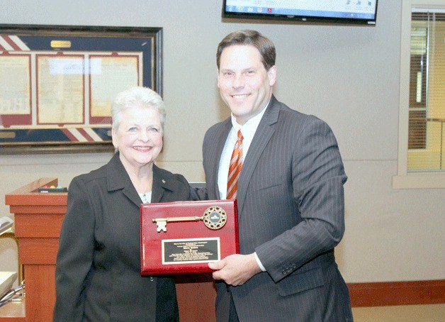 Mayor Jim Ferrell presents the Key to the City award to Mary Gates