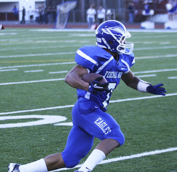 Federal Way senior running back D.J. May ran for 234 yards and three touchdowns during the Eagles' 48-20 win over Emerald Ridge Thursday at Federal Way Memorial Stadium. The Eagles remained unbeaten at 4-0.