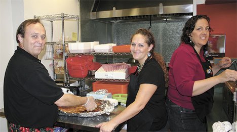 Left to right: Steve Sheeley with his daughter Yvonne Emanoff and spouse Barb Sheeley make ready for hungry customers at Shorty’s Grub House in Federal Way.