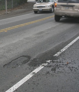 A pothole at the corner of S. 312th Street and 28th Avenue South in Federal Way.