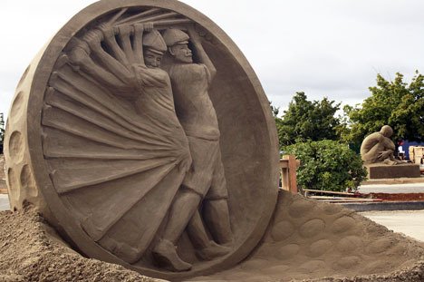 'In the Sand Trap Again' by John Gowdy was one of sculptures featured in the 2011 Sand Sculpting Tour of Champions in Federal Way.