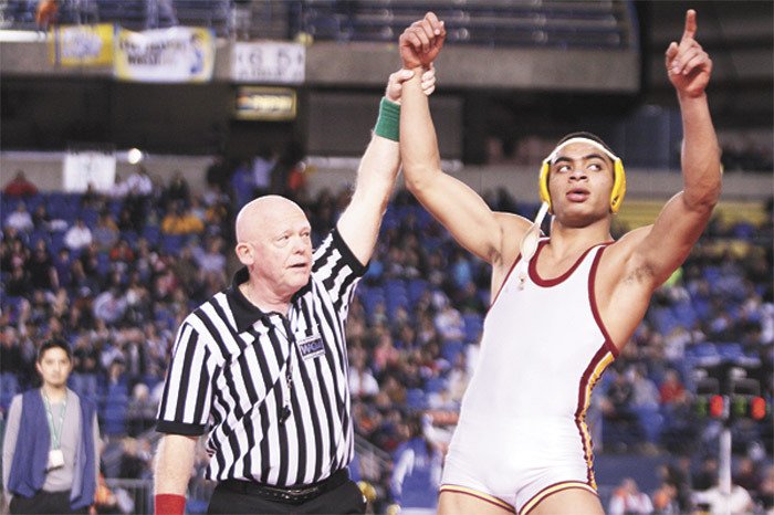 Thomas Jefferson’s K.W. Williams won the 195-pound wrestling state championship in February after finishing second the year before. Williams is now playing defensive back for the Idaho State football team.