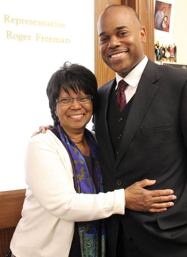State Rep. Roger Freeman (D-Federal Way) at his office in Olympia with his mother