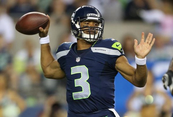 Seattle Seahawks' rookie quarterback Russell Wilson was in Federal Way Monday at Walt's Auto Repair. Wilson signed an autograph for everybody who waited in line