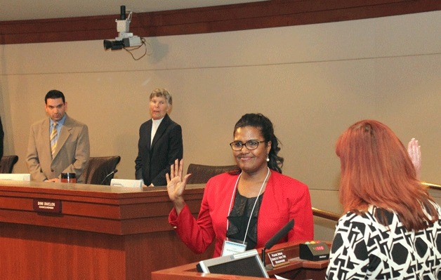 New Federal Way City Councilmember Lydia Assefa-Dawson takes the oath of office on Saturday. Mayor Jim Ferrell vacated the seat when he became mayor in January.