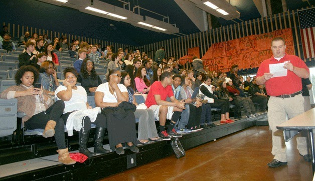 Job applicants wait their turn to be interviewed during a Wild Waves job fair at Todd Beamer High School on Sunday. The business will fill 900 summer positions.