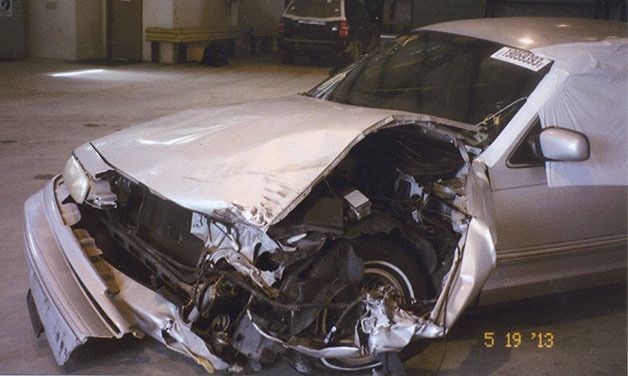 This photo shows the damage to Federal Way resident Jess Todd's 1996 Ford Crown Victoria. A suspect in a stolen truck had crashed into Todd's vehicle on May 6.