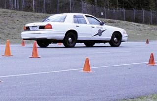 Police recruits were required to perform the Brake Box April 8. The recruits drove their vehicle's into the box (defined by cones)