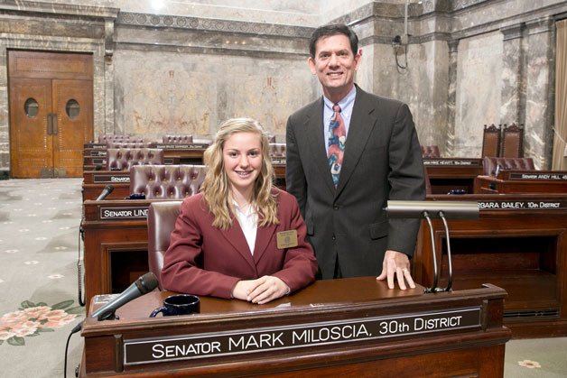 Todd Beamer High School student Karsyn Bryant (left) with Sen. Mark Miloscia. Bryant spent a week as Miloscia’s page in Olympia.
