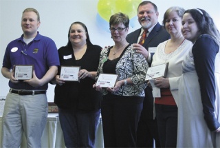 New members of the Federal Way Chamber of Commerce were announced April 1 at the monthly luncheon. Left to right: Scott Sanders