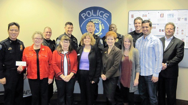 Soroptimist of Federal Way members recently teamed up with the Federal Way Police Department to help families in need.