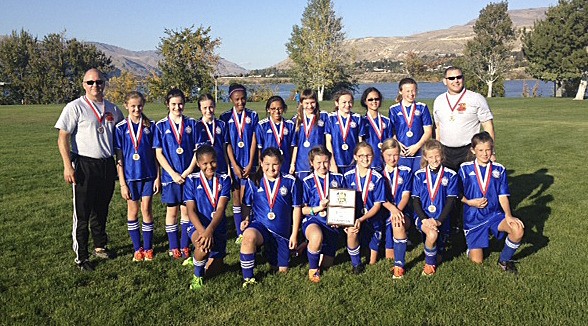 The Federal Way Football Club (FWFC) Wolverines girls under-12 finished in first place in their division at the 2013 Apple Cup soccer tournament in Wenatchee.