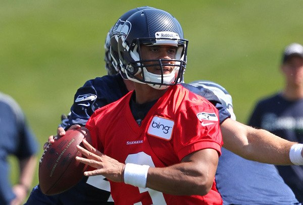 Seattle Seahawk quarterback Russell Wilson's low salary is allowing the team to be a big-time player in the free agent and trade markets this offseason. The Seahawks have already traded for Percy Harvin and signed Cliff Avril.