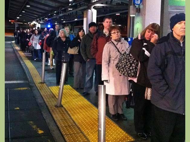 Route 577 attracts long lines of commuters at the Federal Way Transit Center