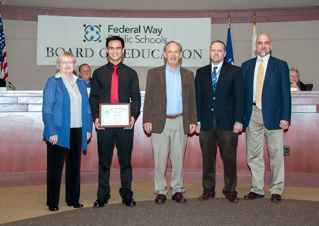 Chris Flores (second from left)