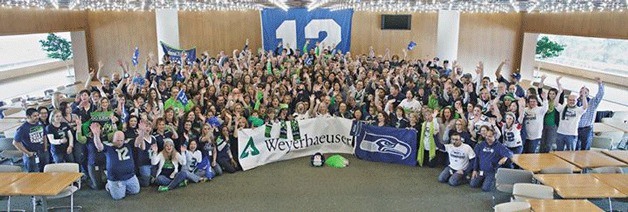 Weyerhaeuser employees show their support for the Seattle Seahawks on Blue Friday in Federal Way.