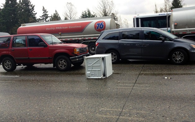 A washing machine on the freeway caused a three-car accident Sunday in Federal Way.