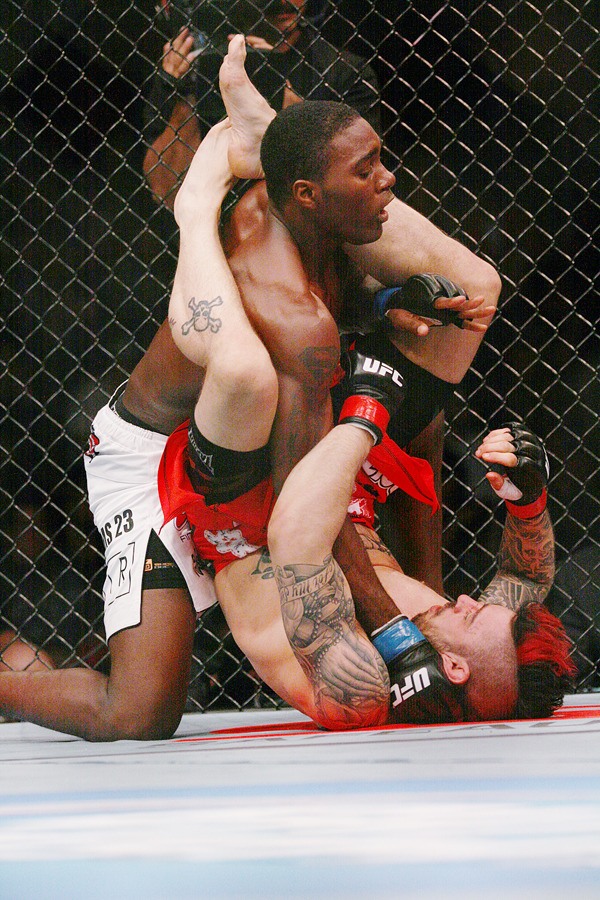 Anthony 'Rumble' Johnson lays on top of Dan Hardy during UFC Fight Night Saturday night at KeyArena in Seattle. Johnson won the 170-pound fight in a decision. The night included 12 fights.