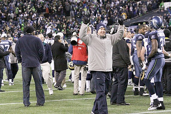 Federal Way Dr. Jim Kurtz celebrates the Seattle Seahawks winning the NFC West on Qwest Field after a win over the St. Louis Rams Jan. 2. Kurtz is in his first season as the Seahawks' team chiropractor.