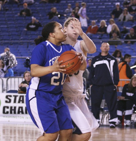 Federal Way junior Brittany Barrington goes to the basket during the Eagles' 43-40 loss to Chiawana in the opening round of the state tournament Wednesday at the Tacoma Dome.