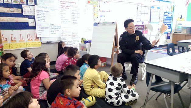 Federal Way Police Department Chief Andy Hwang reads the Dr. Seuss classic
