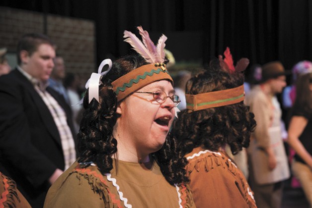 Michelle Ruckwardt sings during dress rehearsal as the cast of Friendship Theatre’s production of “The Music Man” performs a musical number at the Knutzen Family Theatre in Federal Way.