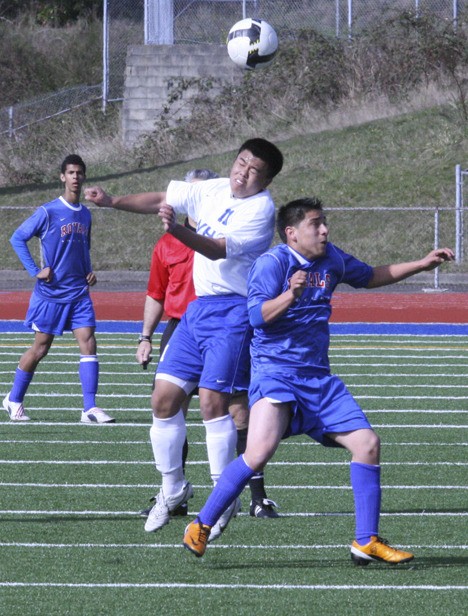 Federal Way sophomore Sean Tang goes up for the header during the Eagles' 3-0 win over Kent-Meridian Tuesday at Federal Way Memorial Stadium.