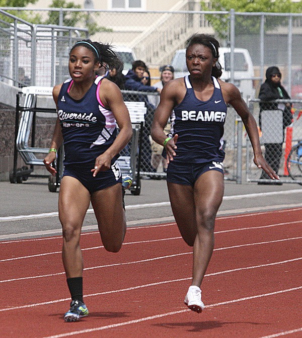 Todd Beamer's Alanna Vann runs a preliminary race in the 100 meters on Friday at the West Central/Southwest District Meet at Mount Tahoma High School. Vann finished second in both the 100 and 200 and will run both at the state meet.