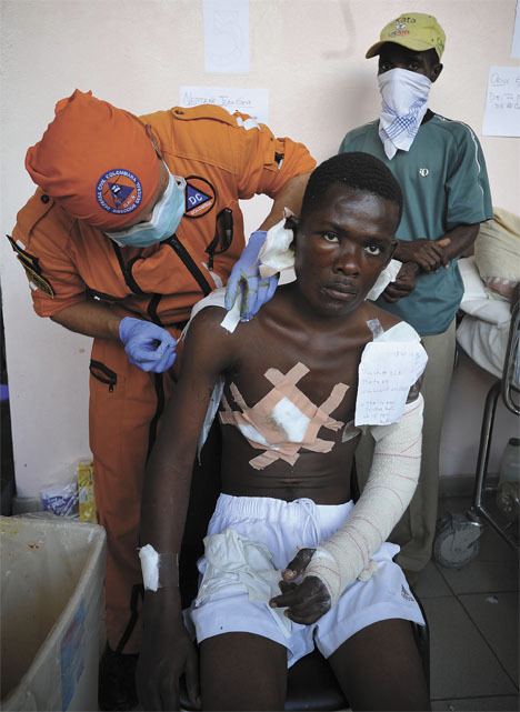 An injured Haiti earthquake survivor is being treated for his injuries Jan. 19. World Vision is sending medial assistance and supplies to Haiti to assist with the relief efforts.