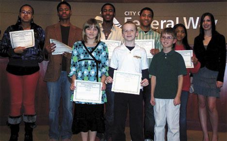 Students from the Federal Way School District display awards they received for essays written for the city's Martin Luther King Jr. essay contest. This year's theme was 'I have a dream for Federal Way.' The students were honored Jan. 19 at the city council meeting at City Hall.