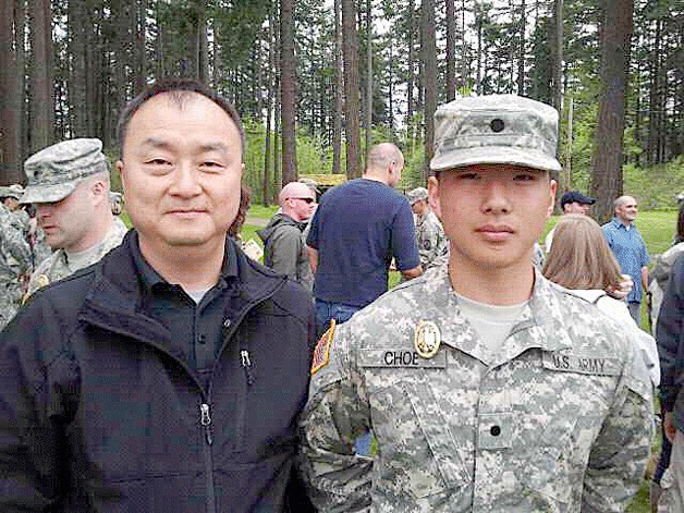 Elliot Choe (right) and his father Wayne.