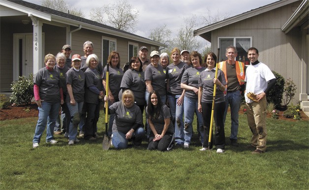 FUSION volunteers planted shrubbery and flowers April 30 in a spring makeover of the charity's NE Tacoma properties.