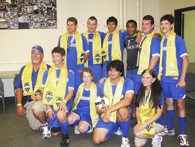 Members of a local Special Olympics soccer team received the coveted Golden Scarf before the Aug. 8 Seattle Sounders FC game. Team members include