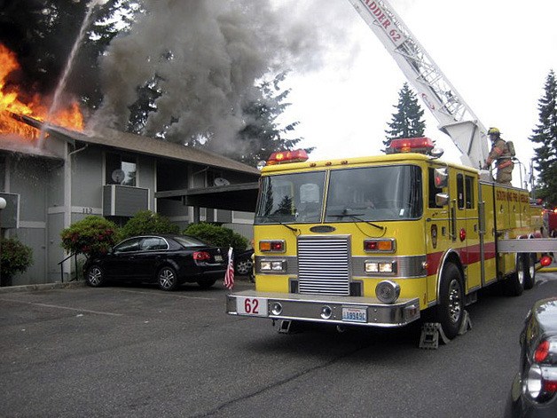This June 2011 photo shows South King Fire and Rescue at work against a residential fire.