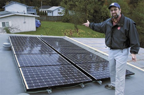 Federal Way resident and business owner Jim Davis installed 10 solar panels on his own roof. He now owns and operates Pacific NW Solar Inc.
