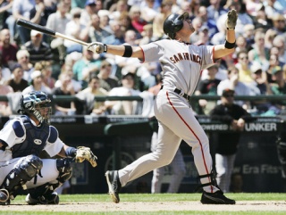 Federal Way High School grad Travis Ishikawa is fighting during spring training to become the San Francisco Giants’ everyday first baseman. Ishikawa leads the Giants with three home runs and is hitting .289 during the spring.