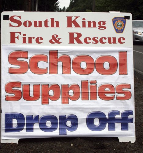 School supply collection bins are at all South King Fire and Rescue stations. This sign sits outside the station on 1st Avenue South in Federal Way. For SKFR donation locations