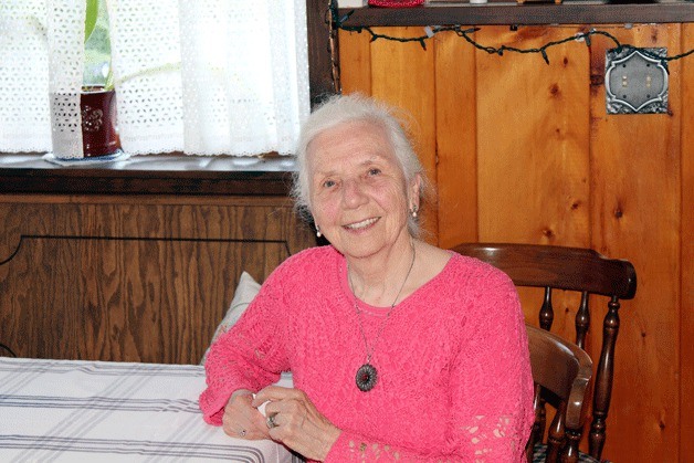 Elfi Hornby sits in her “Bavarian corner” at her Federal Way home. Hornby has written three books detailing what it was like to dance for German soldiers at the Russian front during World War II and the events to follow.
