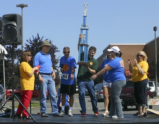 Team Summers of Summers Chiropractic and Massage is awarded the best team trophy. (photo courtesy of Bruce Honda)
