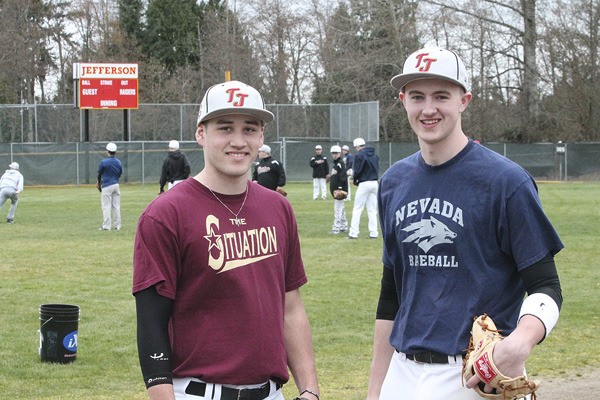 Jefferson’s Niko DelaCruz (left) and Hunter Henry stand on the newly-revamped baseball field at the school