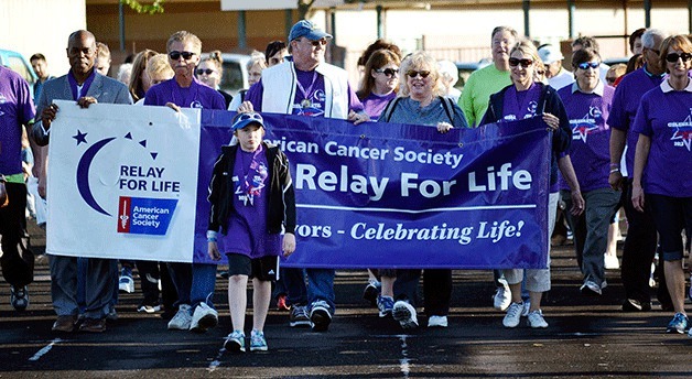 Walkers participate in the 2013 Relay for Life event in Federal Way. This year's event starts at 6 p.m. on June 6 at Saghalie Middle School.